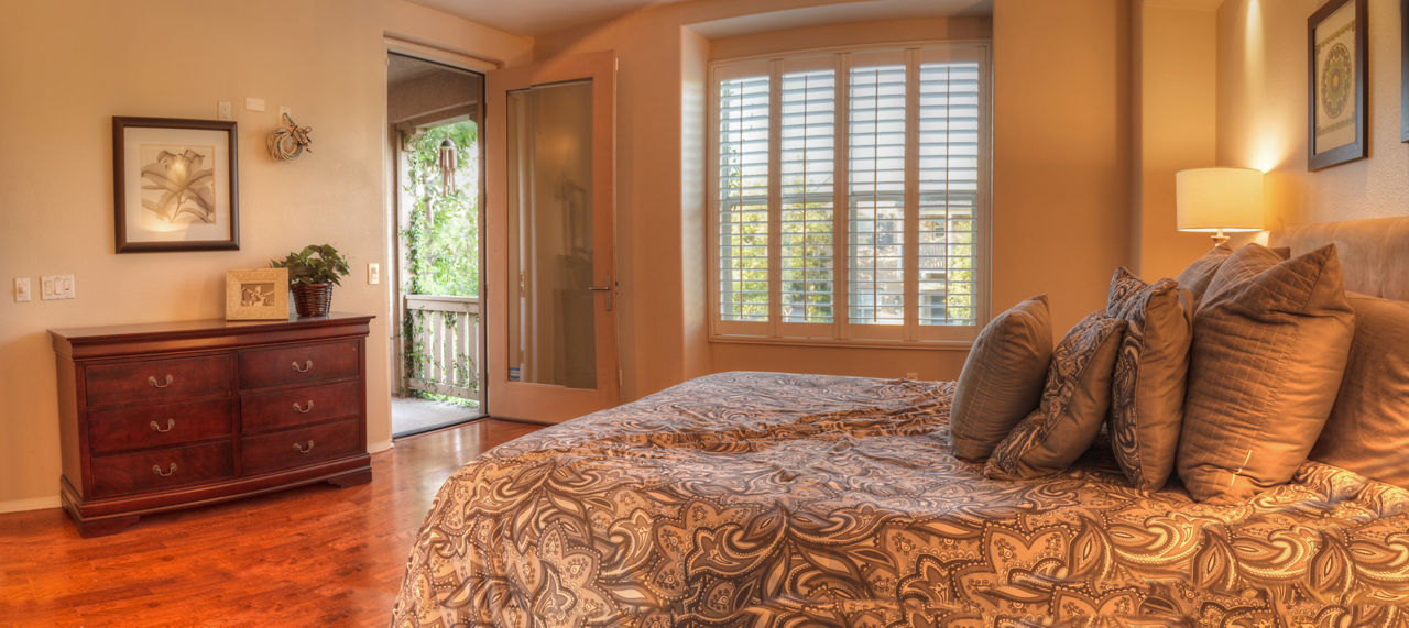 Feng Shui bedroom with bed facing door